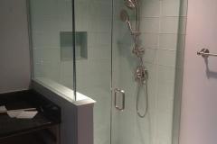 Frameless shower in Reston on glass tile.