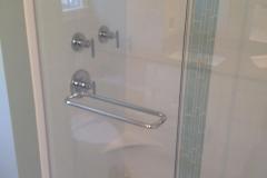 Shower Door and Panel with a Towel Bar Installed in Gainesville.