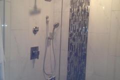 Modern custom frameless shower installation in McLean.