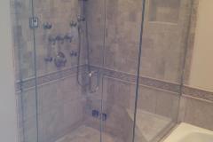 Frameless Shower enclosure installed with Header.