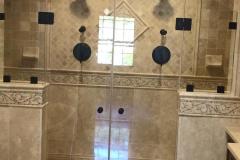 Arched top frameless shower in Reston